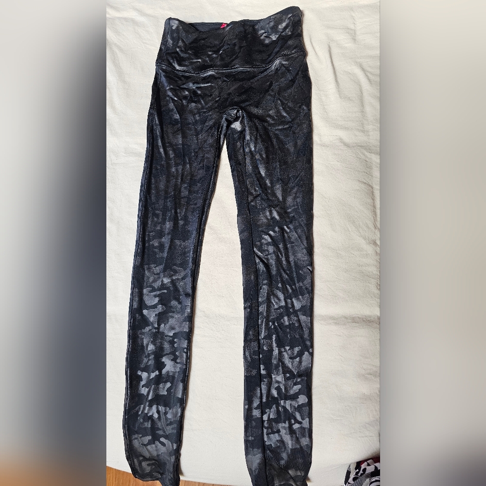 Brand new never worn faux leather camo leggings . M
